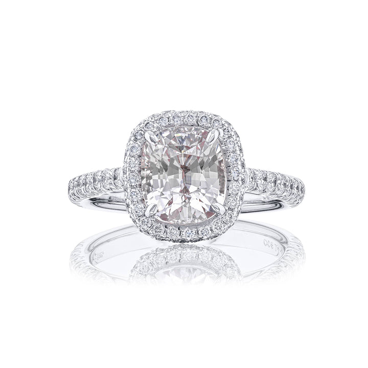 Breathtaking Radiance: Our exquisite 3.09 ct. certified White Sapphire Ring. This beautiful cushion-cut white sapphire cradled in micro pave diamonds is handcrafted in pure platinum.