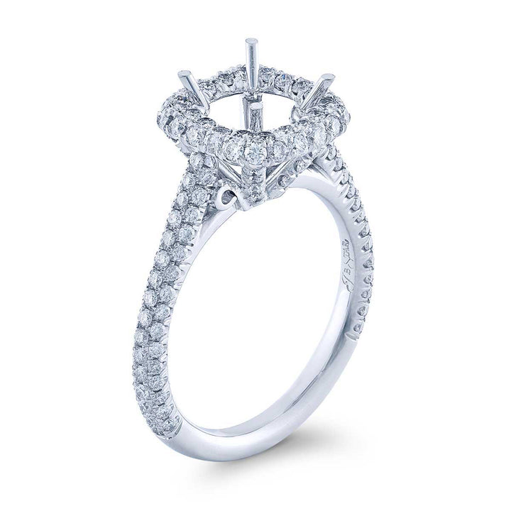 Beautiful diamond semi-mount featuring round diamonds in a micro pave halo setting. Handcrafted in pure platinum.