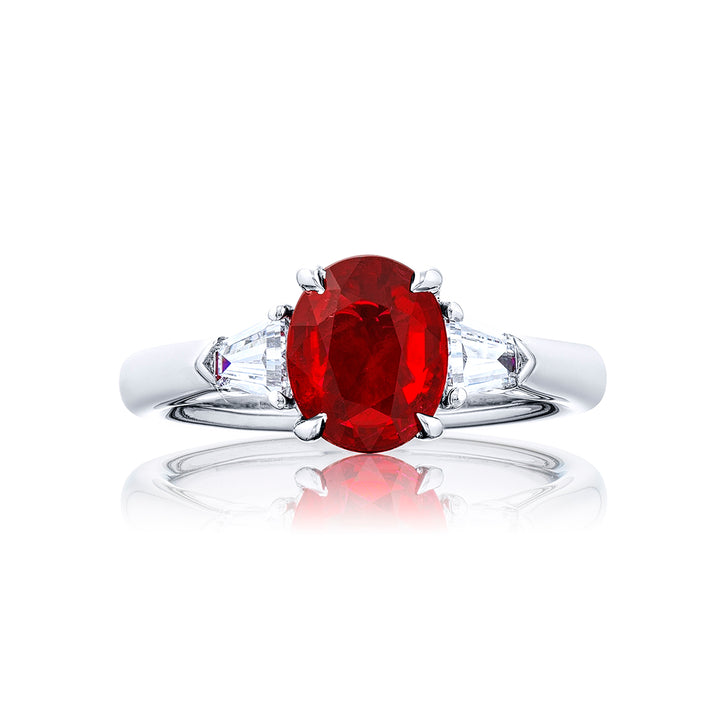 Breathtaking Radiance: Our elegant 2.16 ct. certified Ruby Ring. This stunning oval ruby flanked by tapered baguette diamonds is handcrafted in pure platinum.