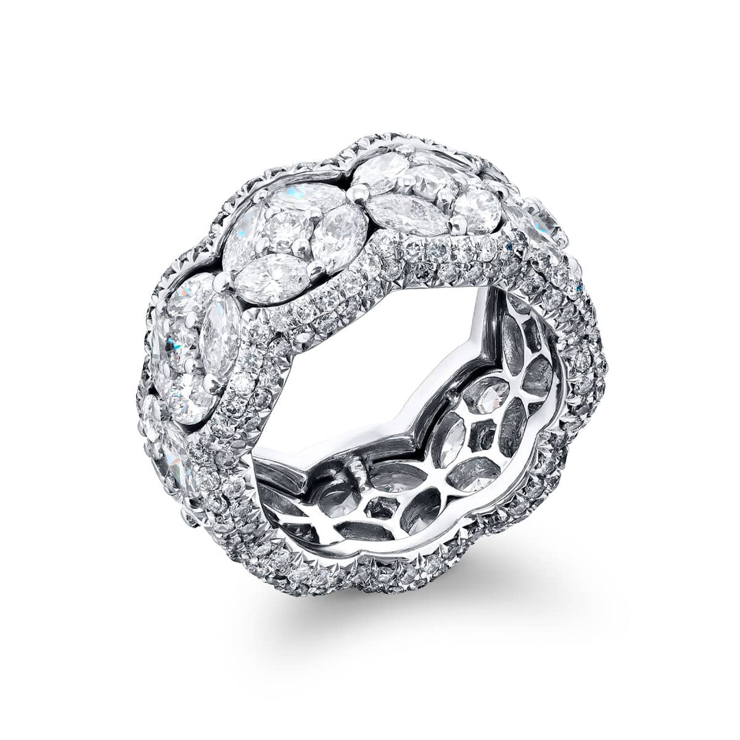 Alluring Eternity: Our beautiful Three-Row Diamond Eternity Band. These stunning marquise diamonds embraced by round and micro pave diamonds are handcrafted in pure platinum.