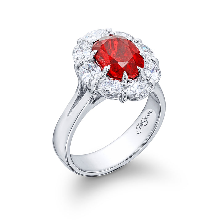 Stunning Ruby and diamond ring featuring a 3.13 ct. certified Burma oval-cut Ruby encircled by oval diamonds. Handcrafted in pure platinum.