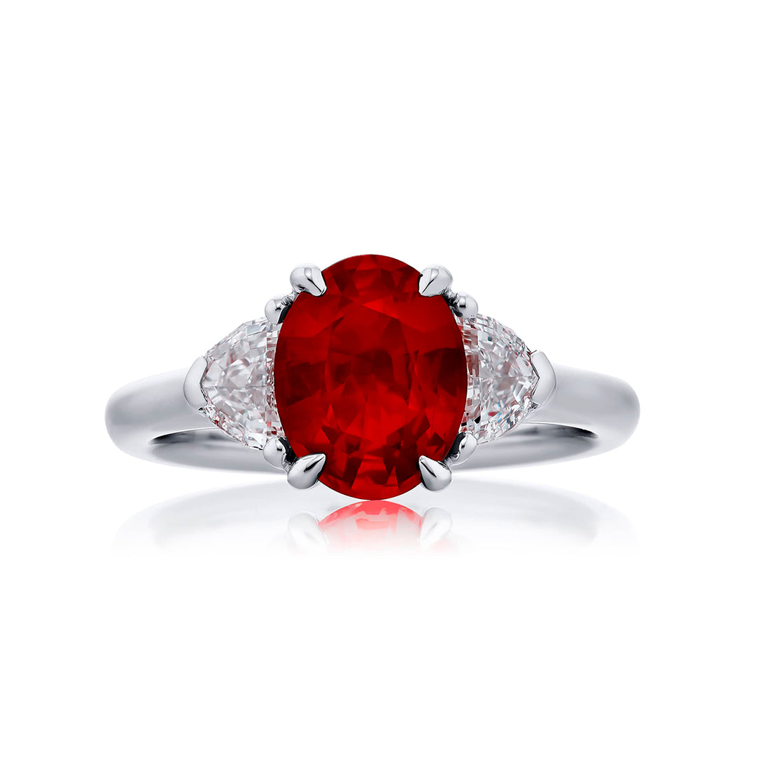 Breathtaking Radiance: Our beautiful 2.17 ct. certified Ruby Ring. This beautiful oval ruby flanked by dazzling epaulette diamonds is handcrafted in pure platinum.
