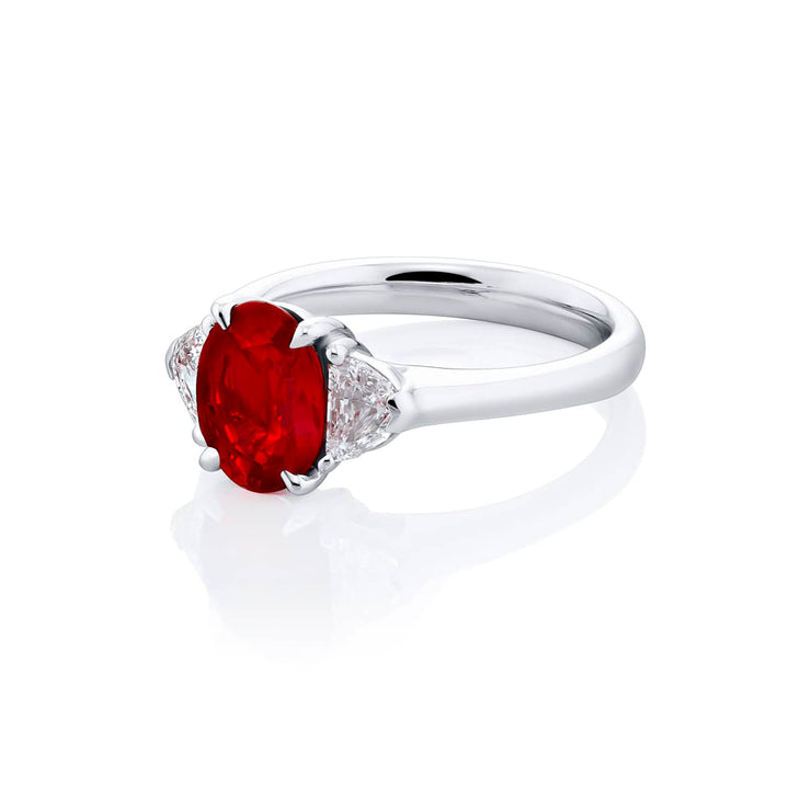 Breathtaking Radiance: Our beautiful 2.17 ct. certified Ruby Ring. This beautiful oval ruby flanked by dazzling epaulette diamonds is handcrafted in pure platinum.