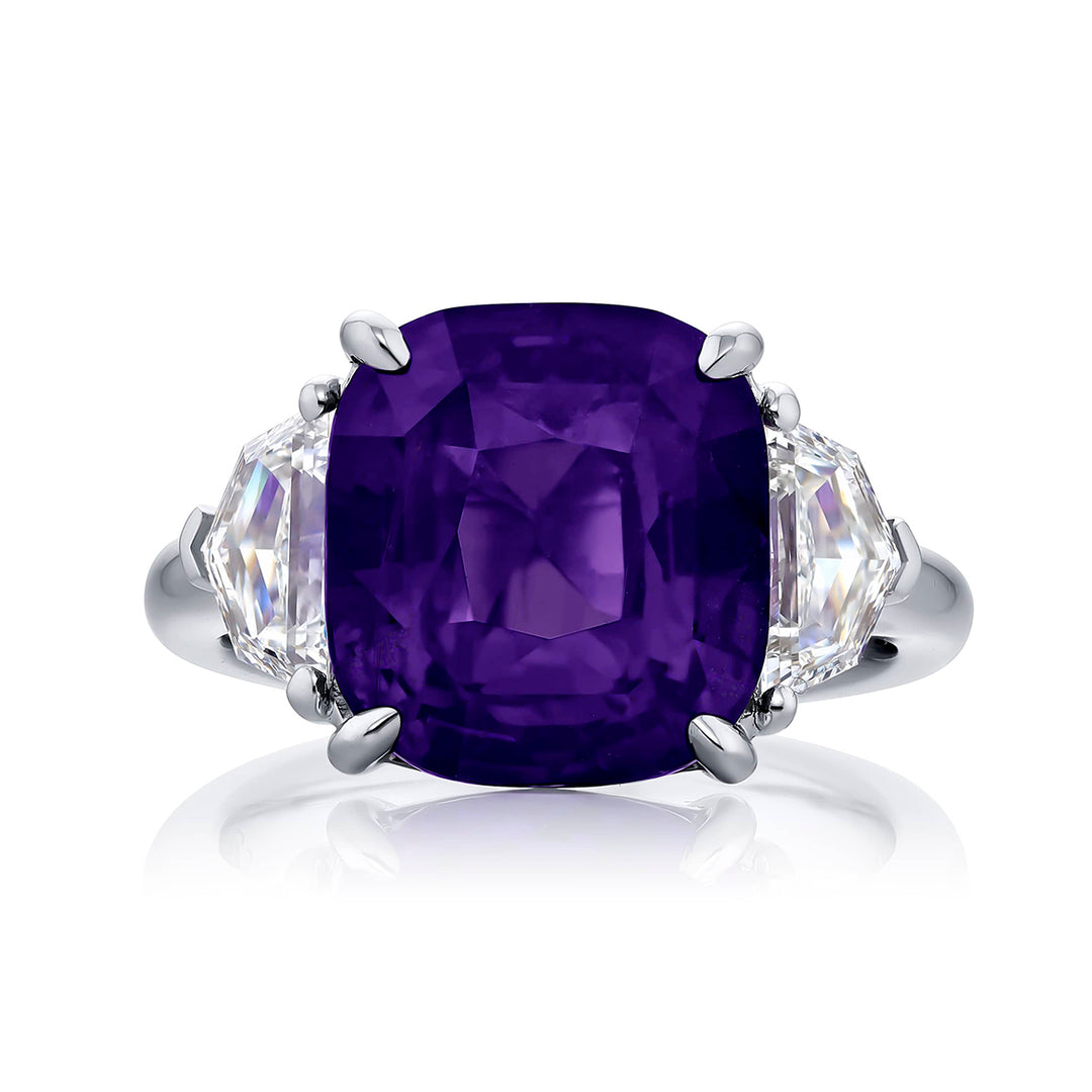 Breathtaking Radiance: Our magnificent 8.50 ct. certified No-Heat Purple Sapphire Ring. This beautiful cushion-cut purple sapphire flanked by epaulette diamonds is handcrafted in pure platinum.