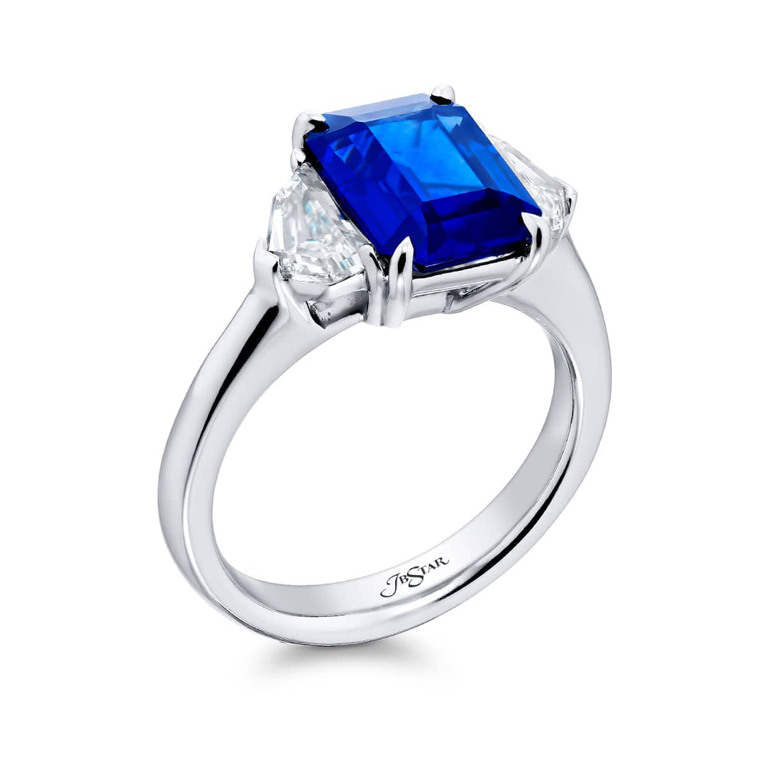 Breathtaking Radiance: Our stunning 3.76 ct. GIA certified Sapphire Ring. This gorgeous emerald-cut sapphire embraced by epaulette diamonds is handcrafted in pure platinum.