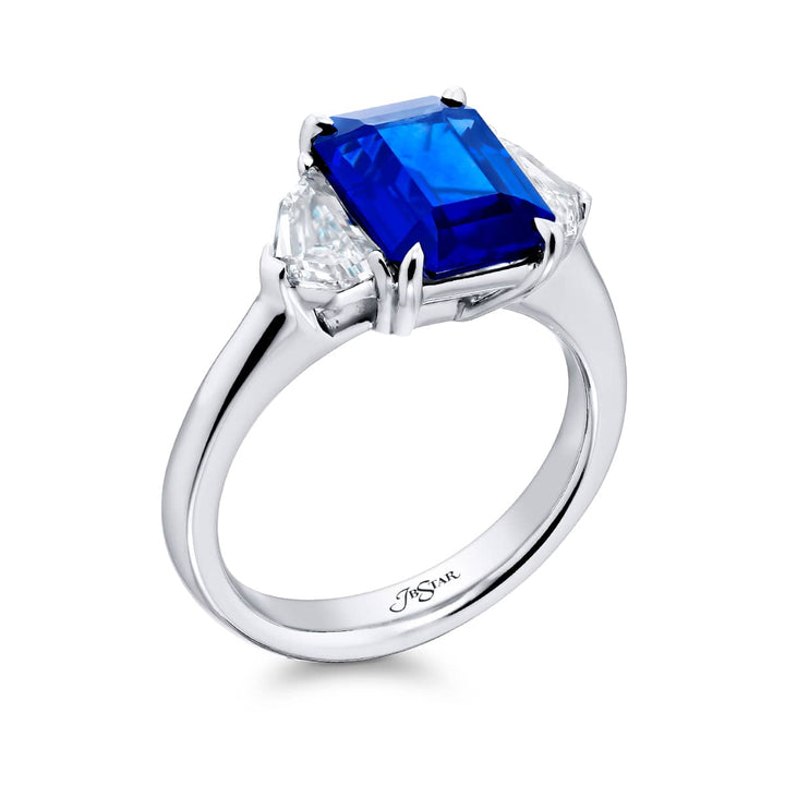 Breathtaking Radiance: Our stunning 3.76 ct. GIA certified Sapphire Ring. This gorgeous emerald-cut sapphire embraced by epaulette diamonds is handcrafted in pure platinum.