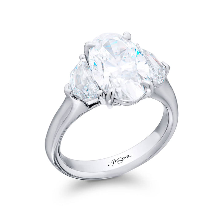 Dazzling Brilliance: Our timeless 3.52 ct. GIA certified Diamond Ring. This oval diamond flanked by stunning epaulette diamonds is handcrafted in pure platinum.