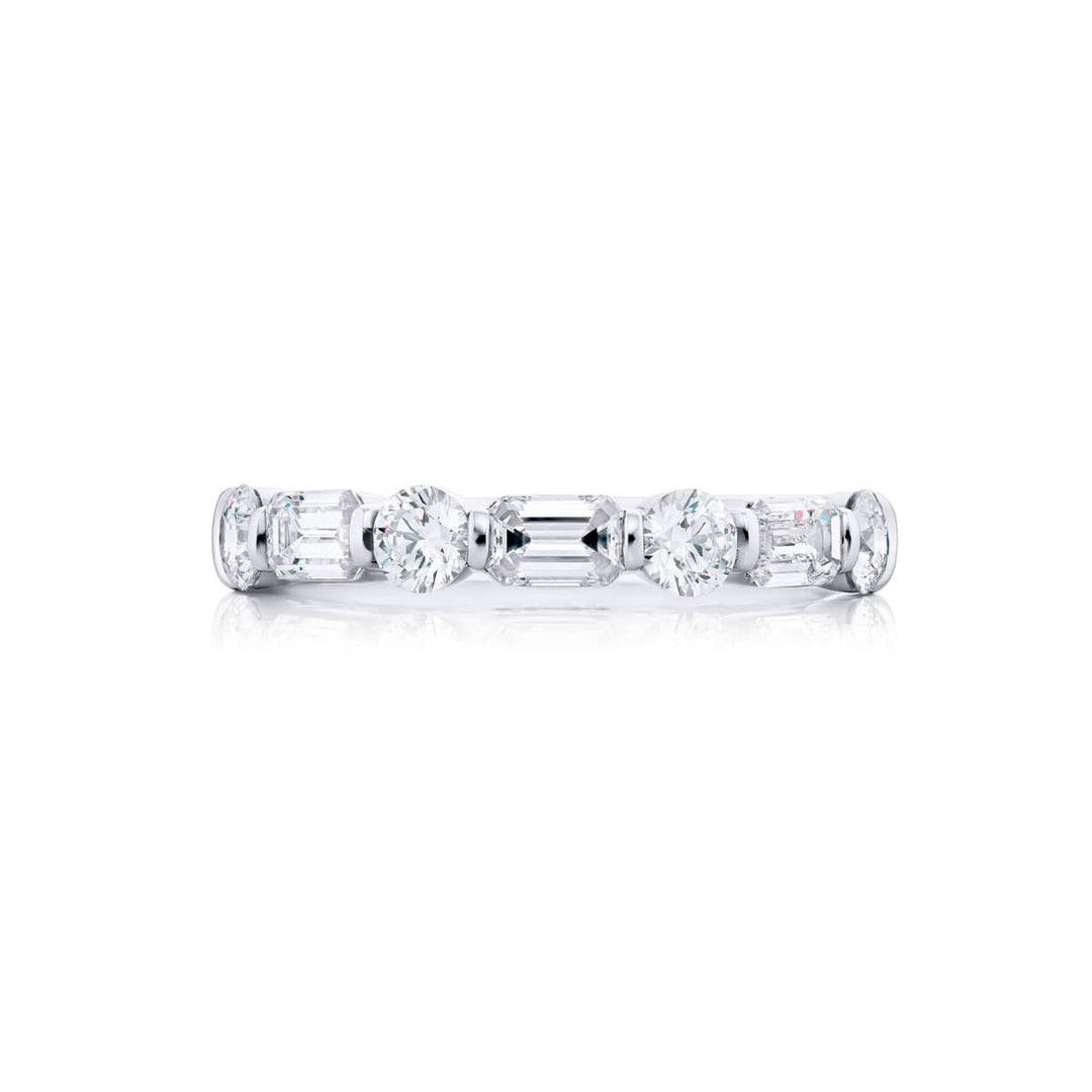 Elegance Elevated: Our stunning 1.14 ctw. East-West Bar Set Diamond Band. These beautiful emerald-cut diamonds accompany round diamonds and are handcrafted in pure platinum.