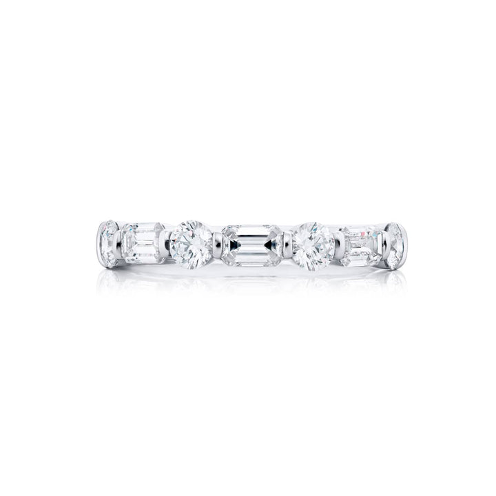 Elegance Elevated: Our stunning 1.14 ctw. East-West Bar Set Diamond Band. These beautiful emerald-cut diamonds accompany round diamonds and are handcrafted in pure platinum.