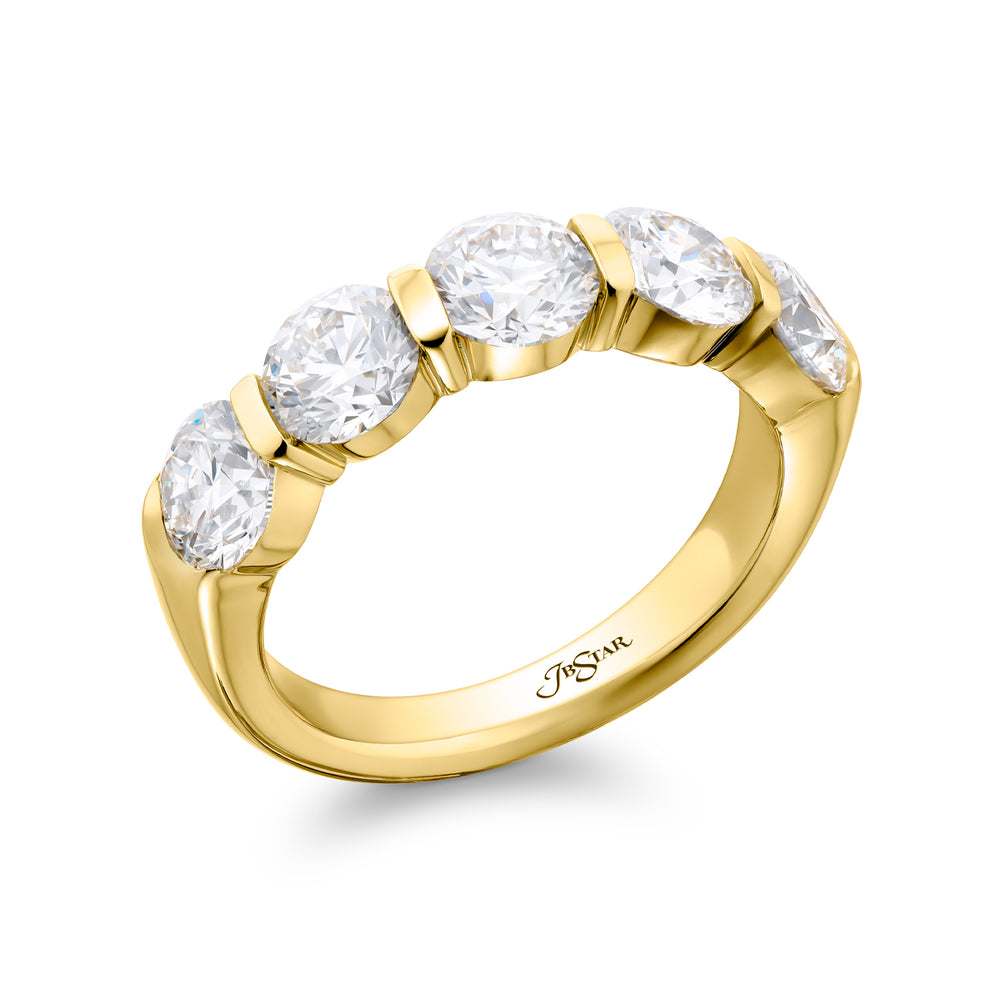 Elegance Elevated: Our stunning 2.72 ctw. Bar Set Diamond Band. These five beautiful round diamonds are handcrafted in 18K yellow gold.