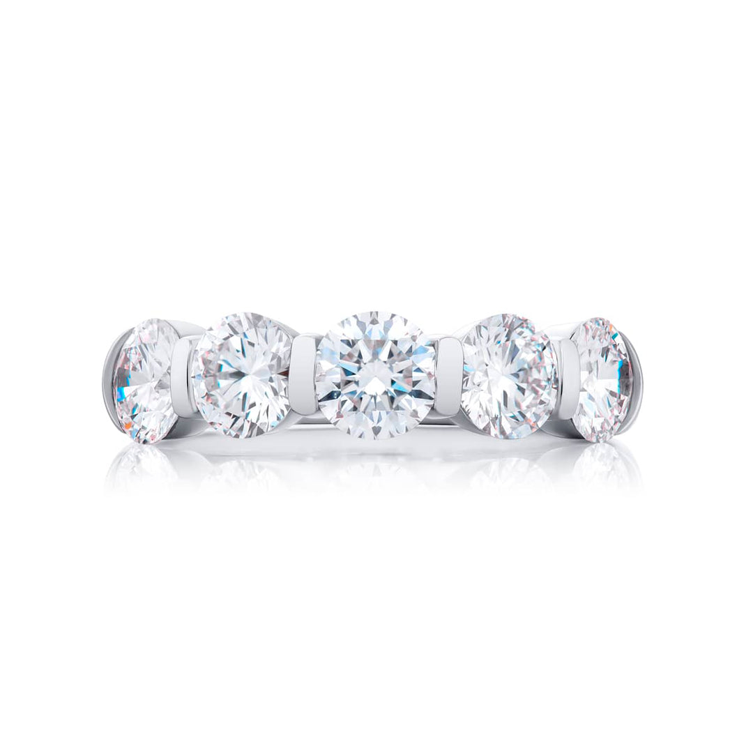 Elegance Elevated: Our signature 2.77 ctw. Bar Set Diamond Band. These five beautiful round diamonds are handcrafted in pure platinum.
