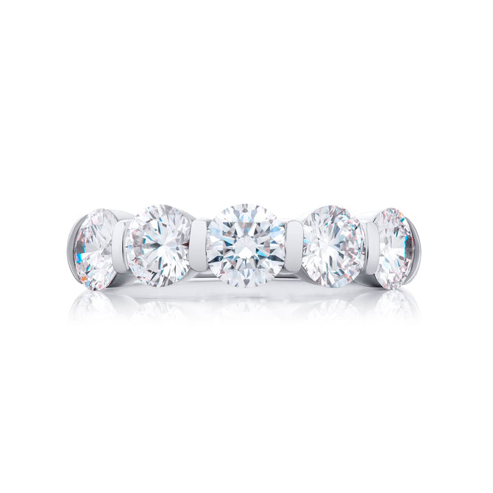 Elegance Elevated: Our signature 2.77 ctw. Bar Set Diamond Band. These five beautiful round diamonds are handcrafted in pure platinum.