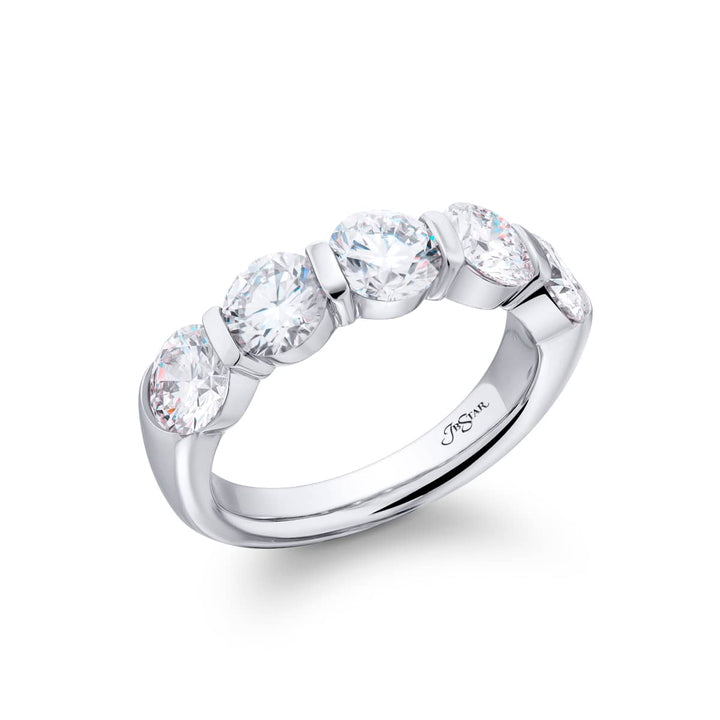 Elegance Elevated: Our signature 2.77 ctw. Bar Set Diamond Band. These five beautiful round diamonds are handcrafted in pure platinum.
