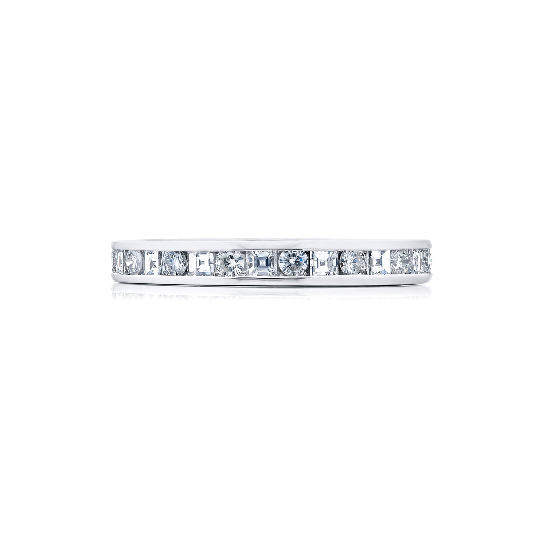 Alluring Eternity: Our stunning Channel Diamond Eternity Band. These beautiful square emerald-cut and round diamonds are handcrafted in pure platinum.