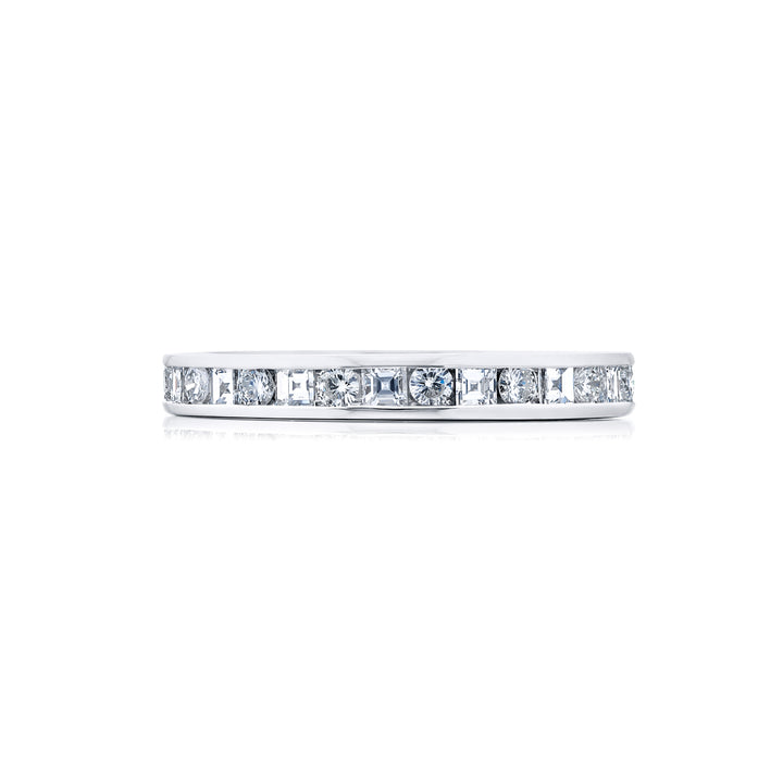 Alluring Eternity: Our stunning Channel Diamond Eternity Band. These beautiful square emerald-cut and round diamonds are handcrafted in pure platinum.