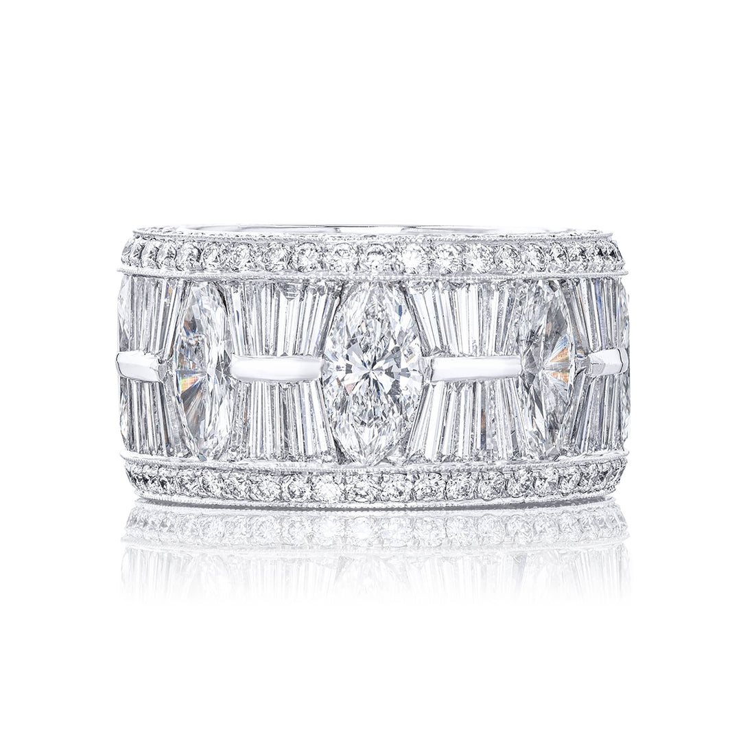 Gorgeous diamond eternity band feautring stunning tapered baguette and marquise diamonds in channel setting all edged in micro pave. Handcrafted in pure platinum.
