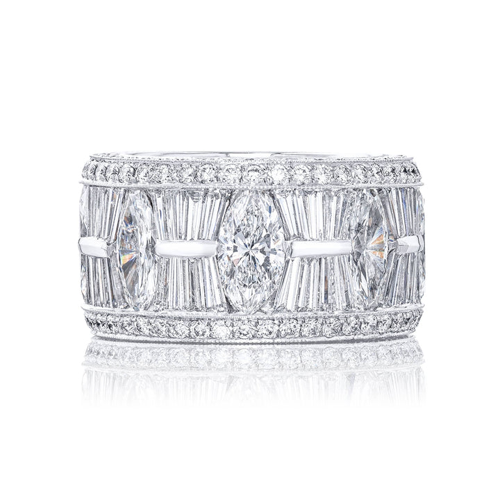 Gorgeous diamond eternity band feautring stunning tapered baguette and marquise diamonds in channel setting all edged in micro pave. Handcrafted in pure platinum.