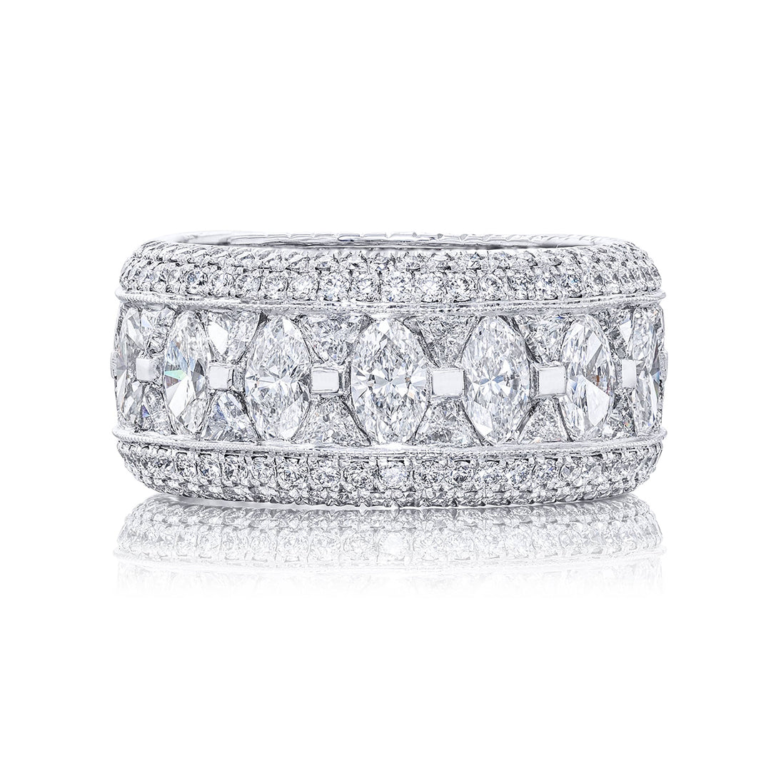 Gorgeous diamond eternity band featuring stunning trillion and marquise diamonds all edged in micro pave. Handcrafted in pure platinum.