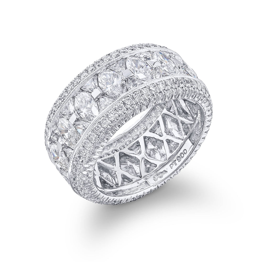 Gorgeous diamond eternity band featuring stunning trillion and marquise diamonds all edged in micro pave. Handcrafted in pure platinum.