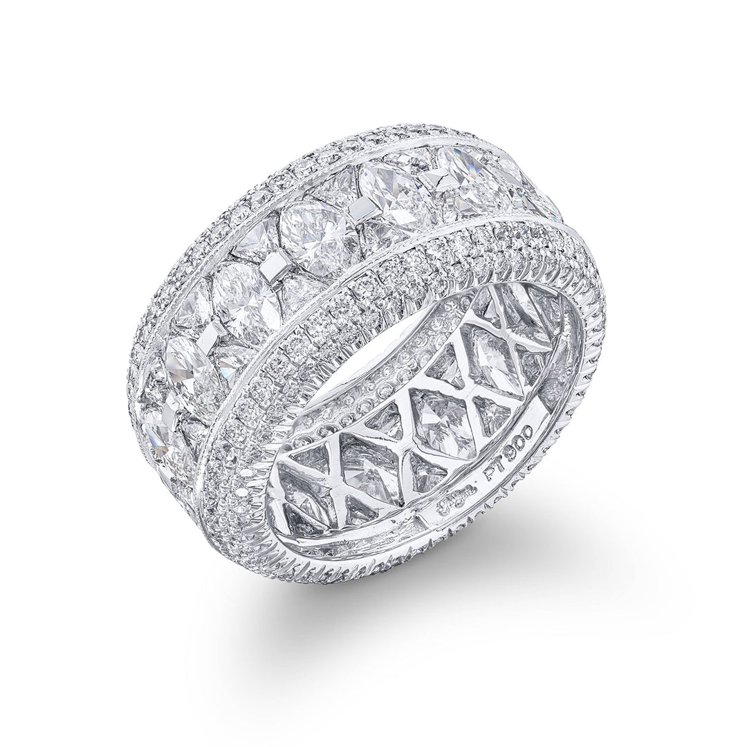 Gorgeous diamond eternity band featuring stunning trillion and marquise diamonds all edged in micro pave. Handcrafted in pure platinum.