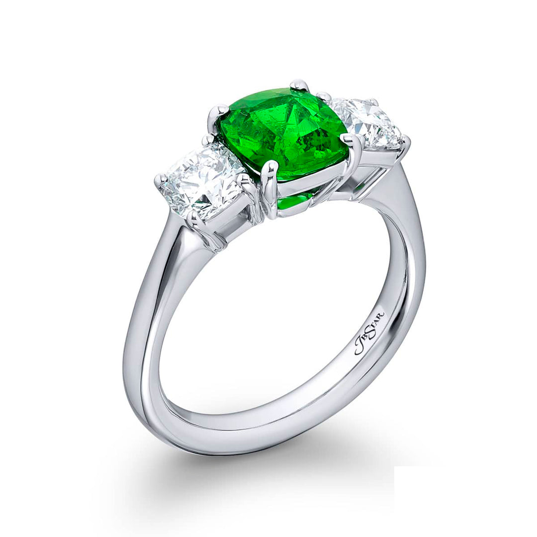 Breathtaking Radiance: Our stunning 1.33 ct. GIA certified Emerald Ring. This beautiful cushion-cut emerald flanked by cushion-cut diamonds is handcrafted in pure platinum.