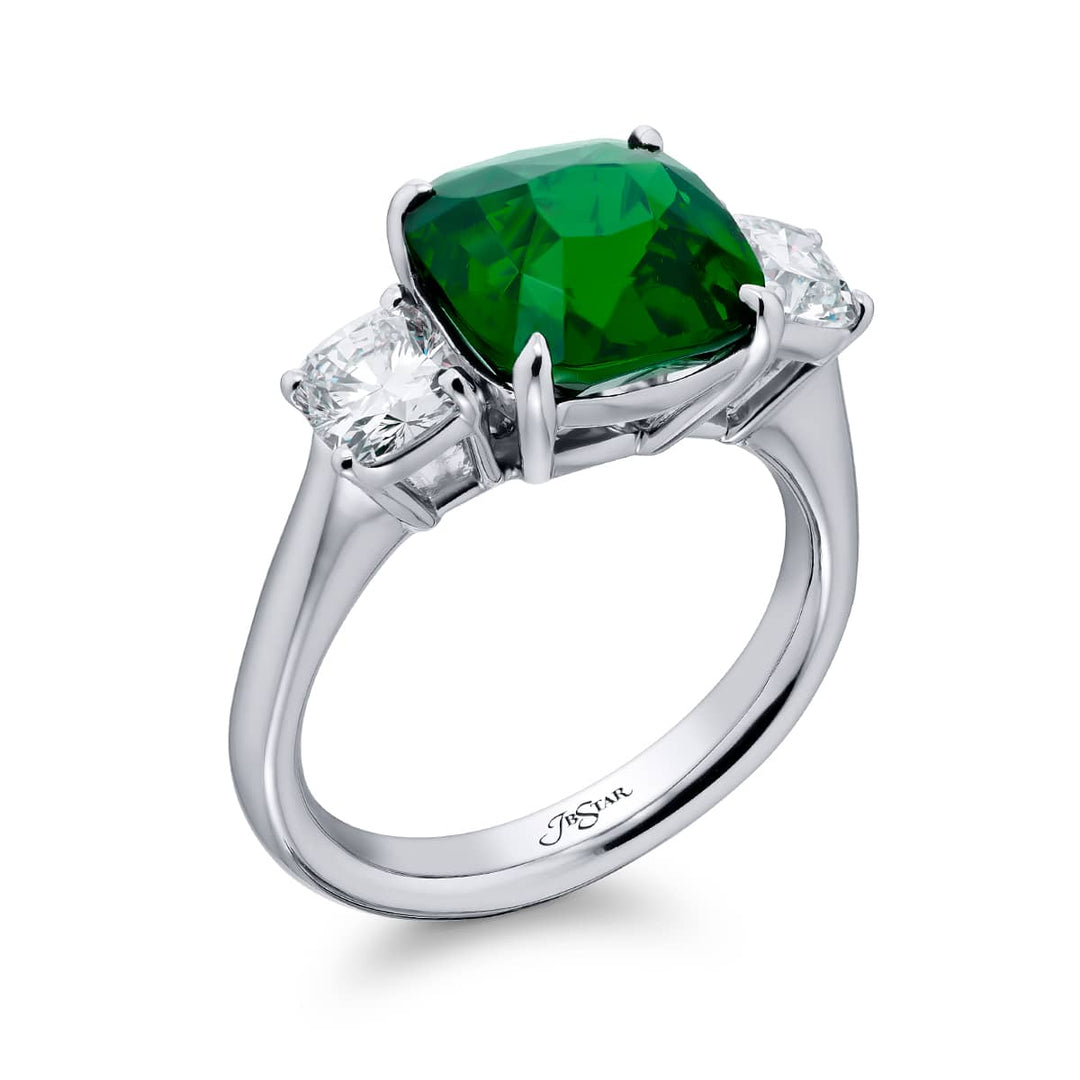 Breathtaking Radiance: Our stunning 5.11 ct. GIA certified Green Tsavorite Ring. This gorgeous cushion-cut green tsavorite embraced by cushion-cut diamonds is handcrafted in pure platinum.