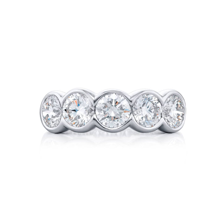 Elegance Elevated: Our signature 2.40 ctw. Bezel Diamond Band. These gorgeous round diamonds are handcrafted in pure platinum.