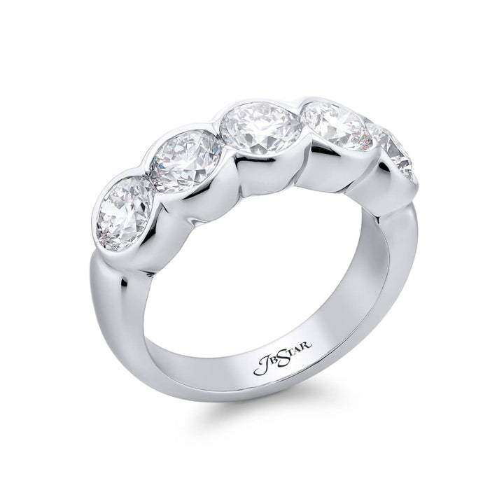 Elegance Elevated: Our signature 2.40 ctw. Bezel Diamond Band. These gorgeous round diamonds are handcrafted in pure platinum.