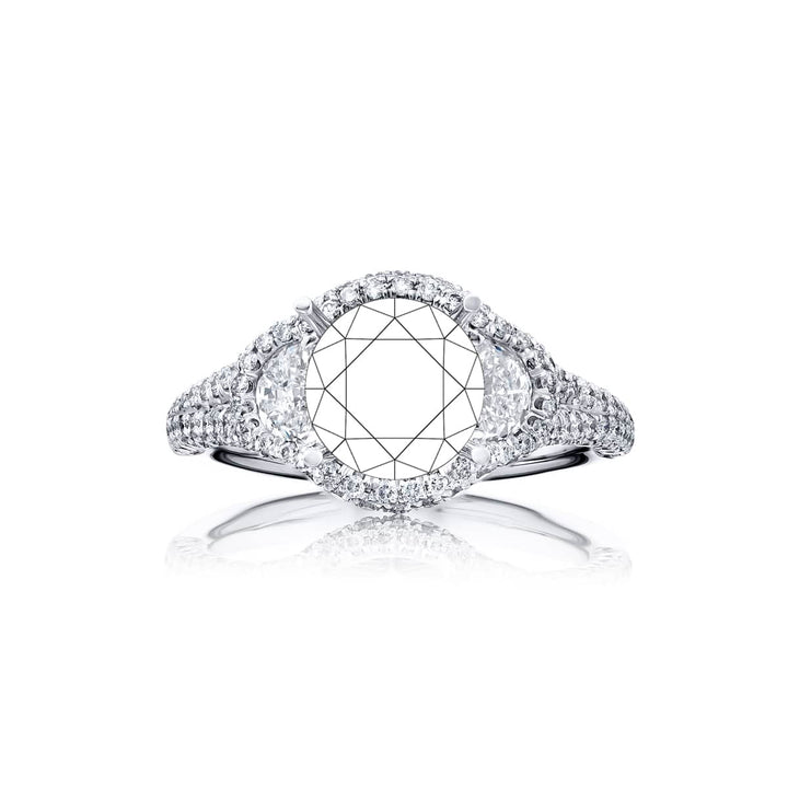Dazzling Brilliance: Our timeless Halo Diamond Semi-mount. These stunning half-moon diamonds embraced by micro pave diamonds are handcrafted in pure platinum.