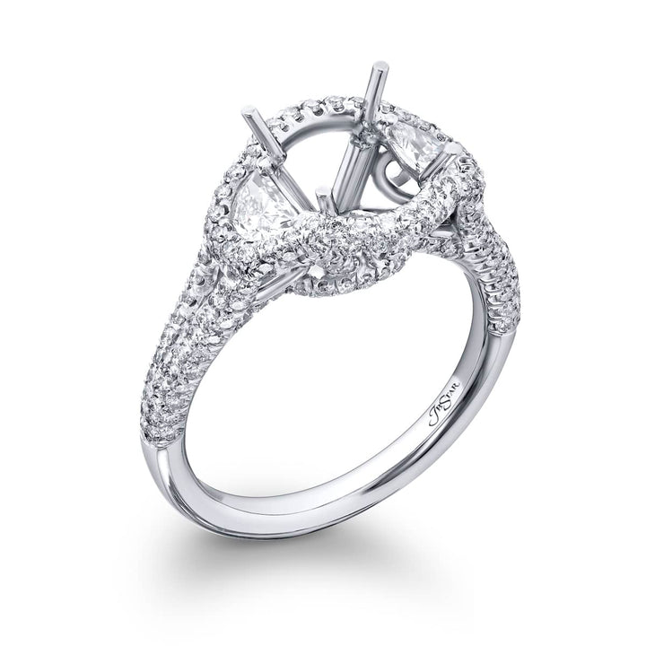 Dazzling Brilliance: Our timeless Halo Diamond Semi-mount. These stunning half-moon diamonds embraced by micro pave diamonds are handcrafted in pure platinum.