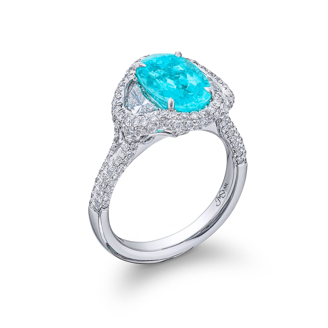 Stunning Paraiba ring featuring a 2.62 ct CDC certified oval embraced by half moon diamonds in a pave setting. Handcrafted in pure platinum.