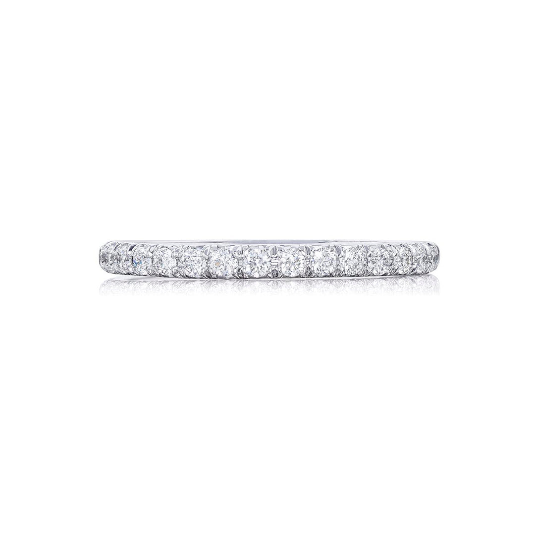 Gorgeous diamond eternity band featuring round diamonds in a cut-down setting. Handcrafted in pure platinum.