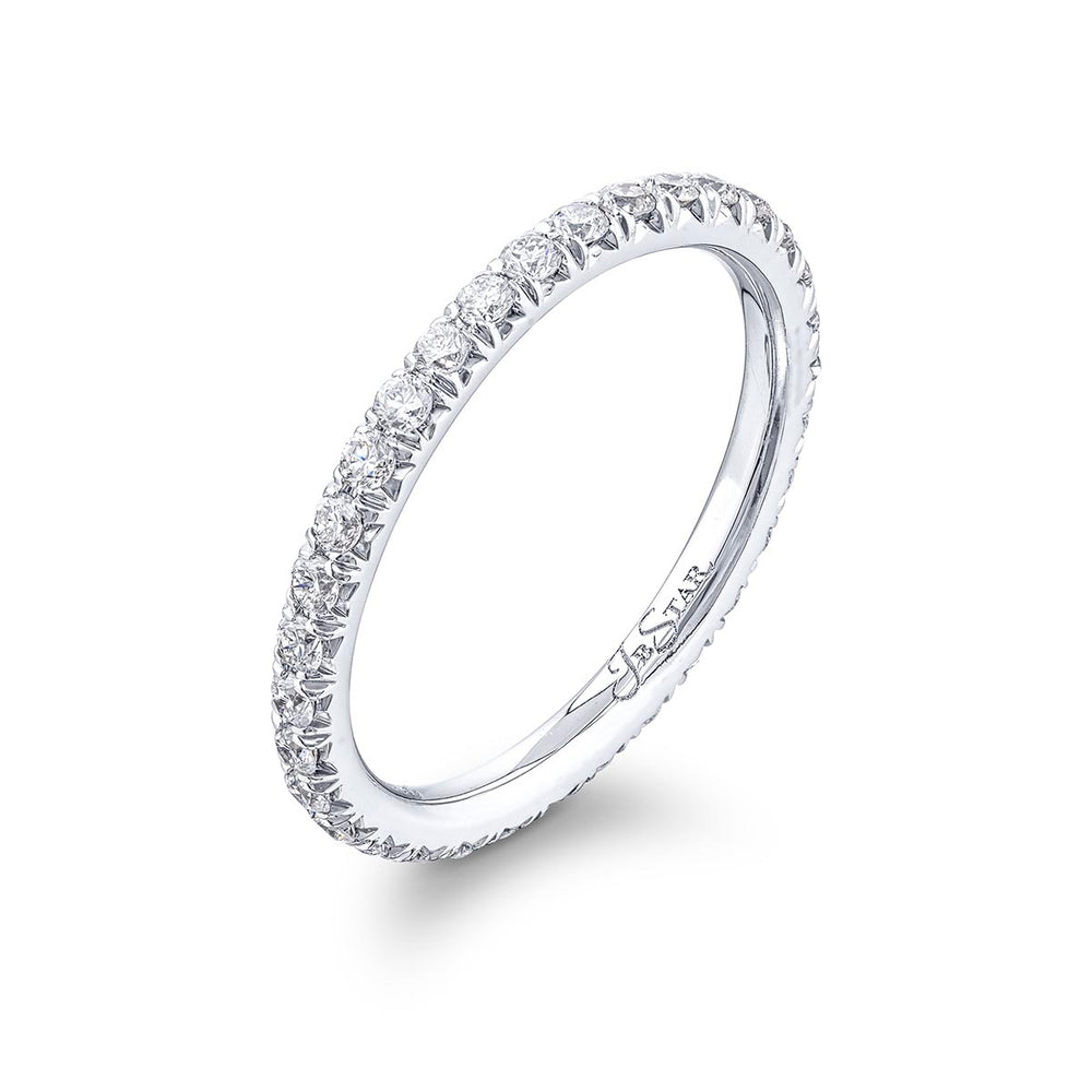 Gorgeous diamond eternity band featuring round diamonds in a cut-down setting. Handcrafted in pure platinum.