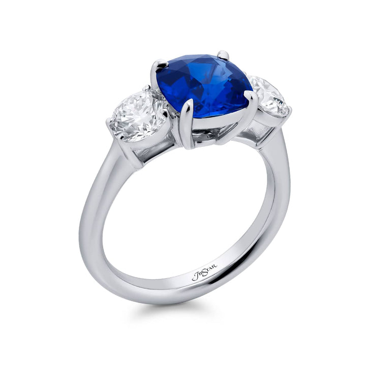 Breathtaking Radiance: Our beautiful 2.53 ct. certified Sapphire Ring. This stunning cushion-cut sapphire flanked by dazzling round diamonds is handcrafted in pure platinum.