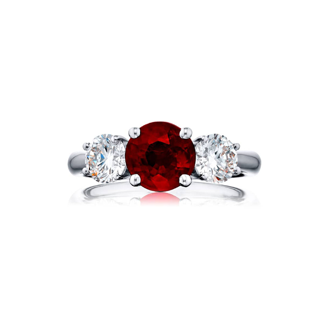 Breathtaking Radiance: Our beautiful 2.00 ct. certified Burmese Ruby Ring. This beautiful round vivid ruby flanked by round diamonds is handcrafted in pure platinum.