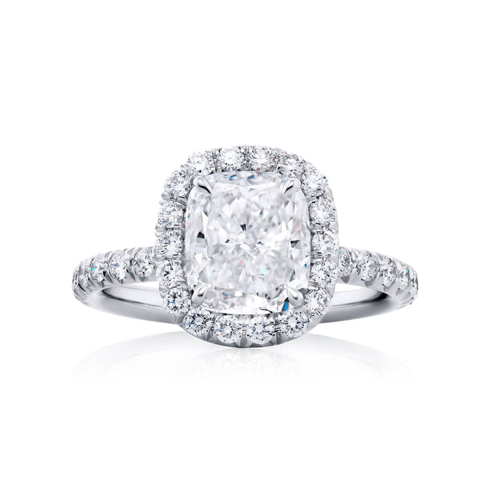 Dazzling Brilliance: Our timeless 1.92 ct. GIA certified Diamond Ring. This gorgeous cushion-cut diamond encircled by micro pave diamonds is handcrafted in pure platinum.