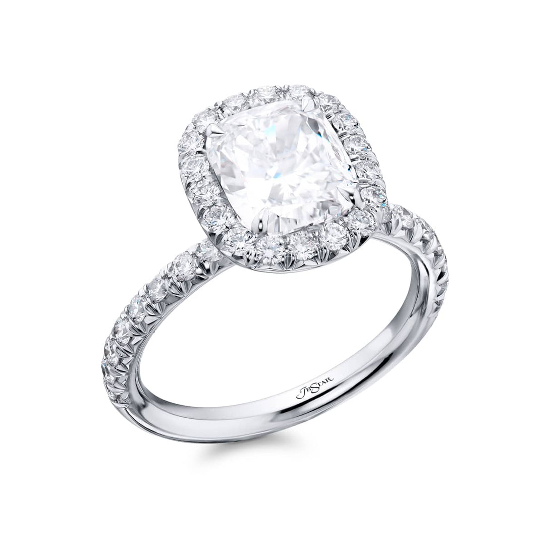 Dazzling Brilliance: Our timeless 1.92 ct. GIA certified Diamond Ring. This gorgeous cushion-cut diamond encircled by micro pave diamonds is handcrafted in pure platinum.