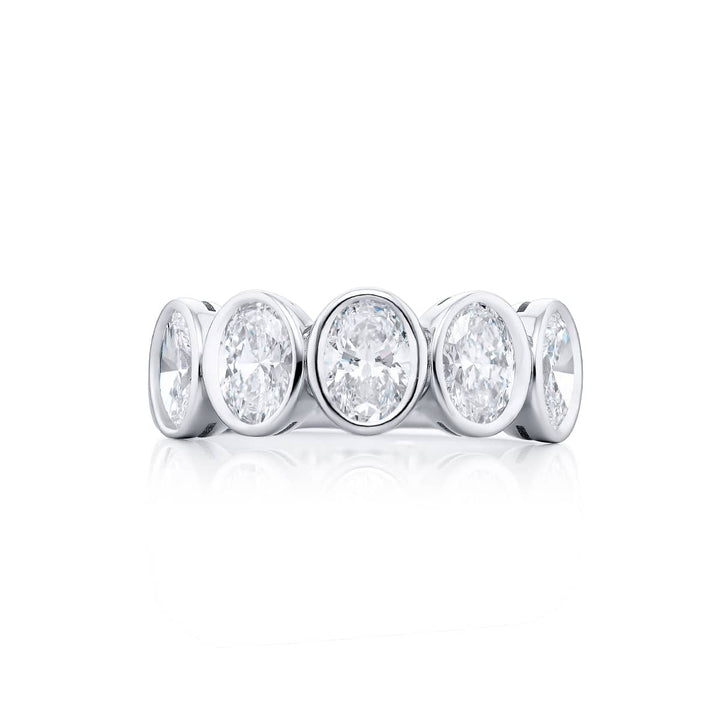 Elegance Elevated: Our stunning 2.05 ctw. GIA certified Bezel Diamond Band. These five beautiful oval diamonds are handcrafted in pure platinum.