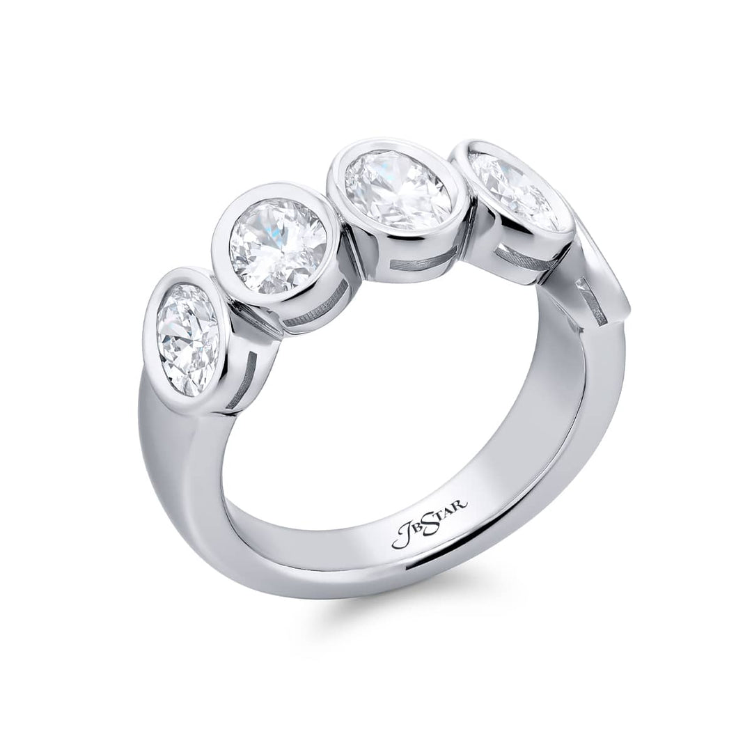 Elegance Elevated: Our stunning 2.05 ctw. GIA certified Bezel Diamond Band. These five beautiful oval diamonds are handcrafted in pure platinum.