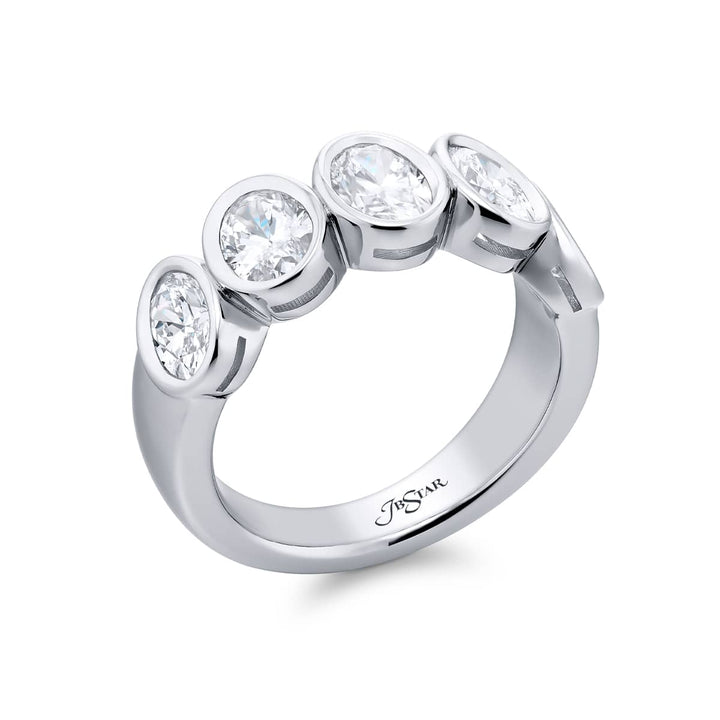 Elegance Elevated: Our stunning 2.05 ctw. GIA certified Bezel Diamond Band. These five beautiful oval diamonds are handcrafted in pure platinum.