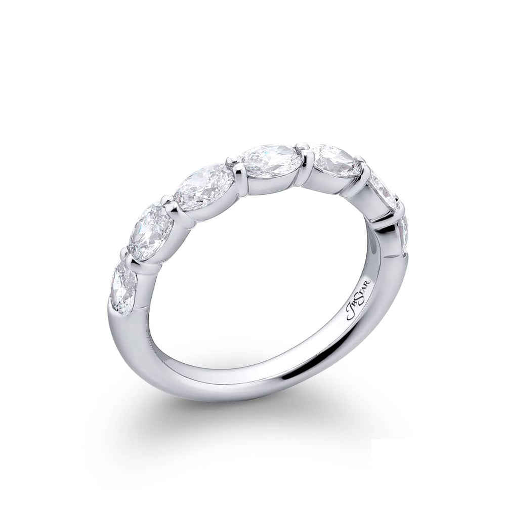 Elegance Elevated: Our stunning 1.52 ctw. East-West Diamond Band. These seven dazzling oval diamonds are handcrafted in pure platinum.