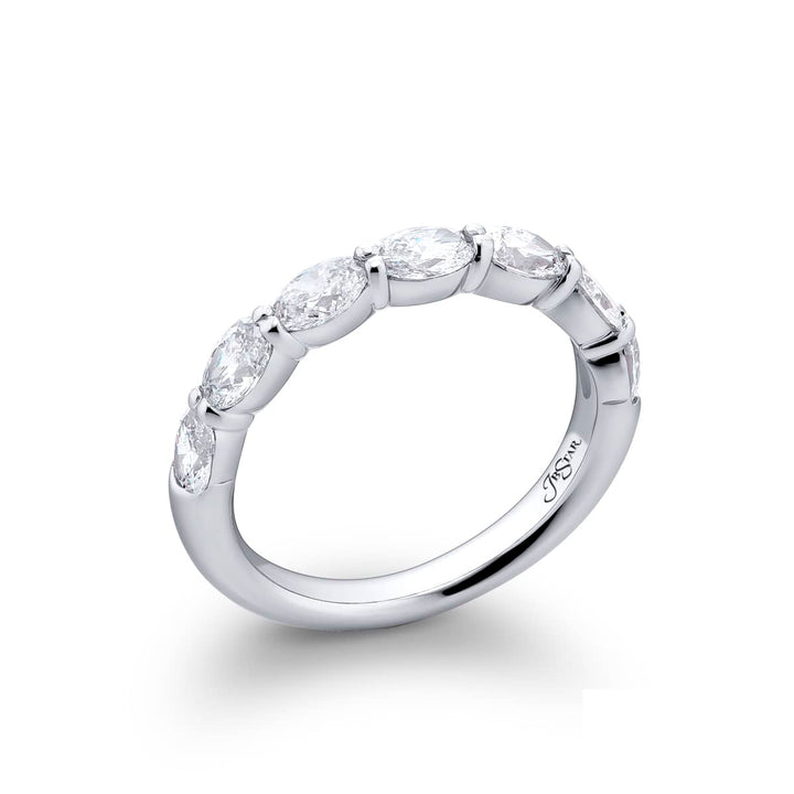 Elegance Elevated: Our stunning 1.52 ctw. East-West Diamond Band. These seven dazzling oval diamonds are handcrafted in pure platinum.