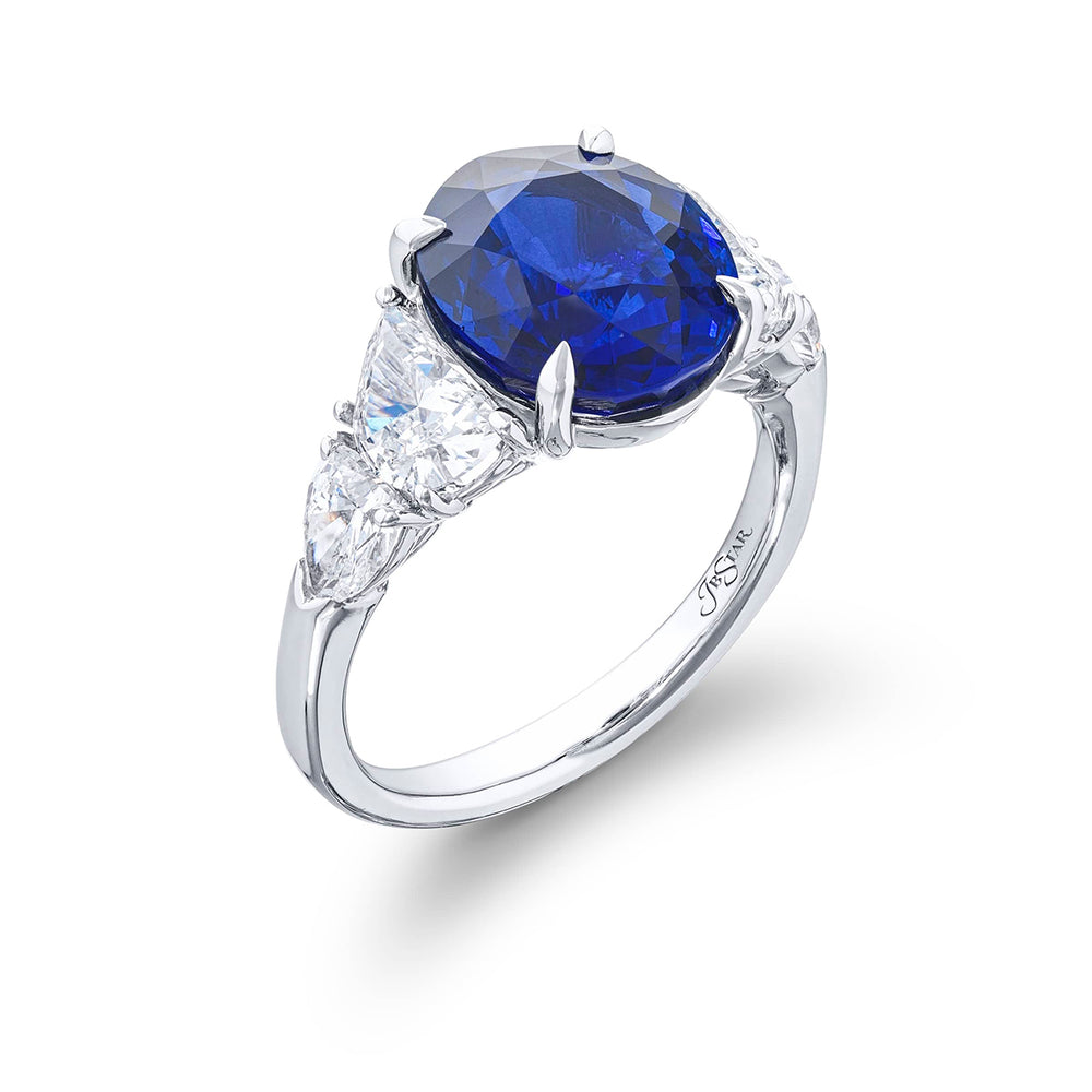 Stunning sapphire and diamond ring featuring a 5.96 ct. GRS certified vivid oval sapphire embraced half-moon and 2 shield diamonds. Handcrafted in pure platinum.