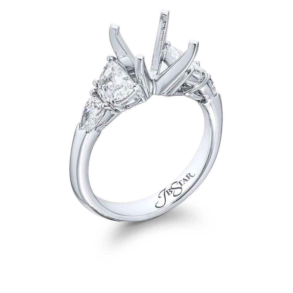 Dazzling Brilliance: Our timeless Diamond Semi-mount. These two half-moon diamonds accompanied by two beautiful shield diamonds are handcrafted in pure platinum.
