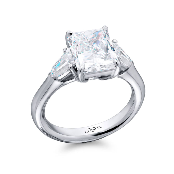 Dazzling Brilliance: Our timeless 3.05 ct. GIA certified Diamond Ring. This gorgeous radiant-cut diamond flanked by bullet diamonds is handcrafted in pure platinum.