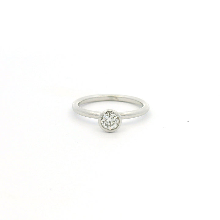 White gold bezel set diamond ring