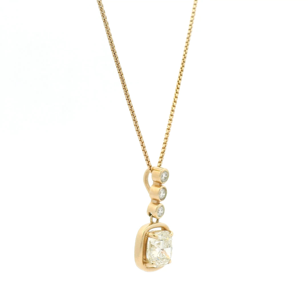 14K yellow gold necklace with bezel and floating set diamonds