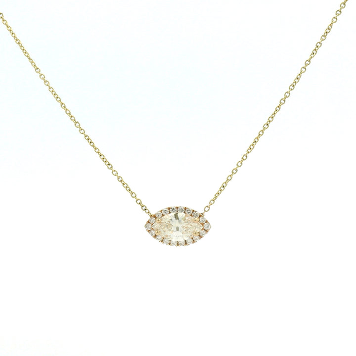 Marquise halo set pendant on yellow gold necklace