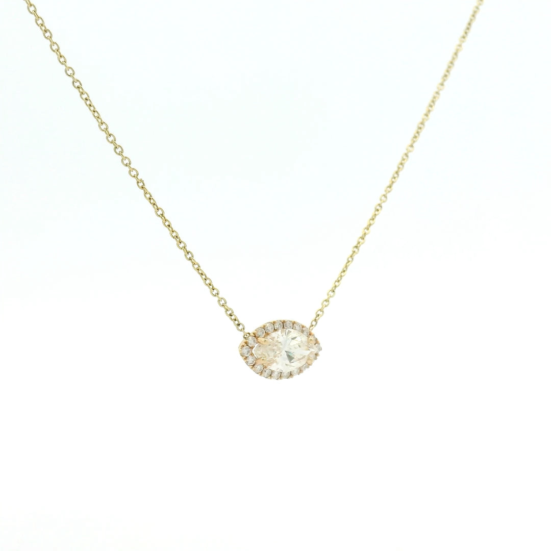 Marquise halo set pendant on yellow gold necklace