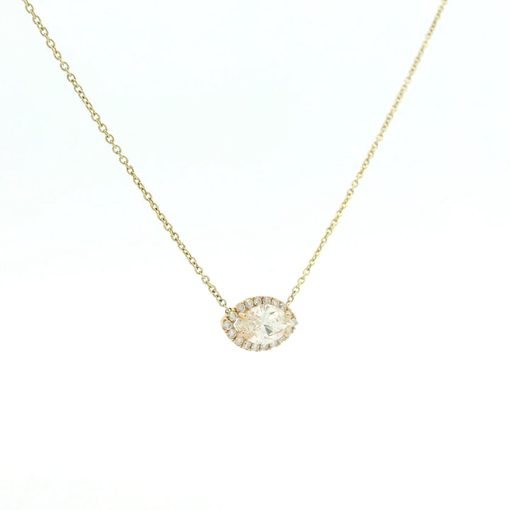 Marquise halo set pendant on yellow gold necklace